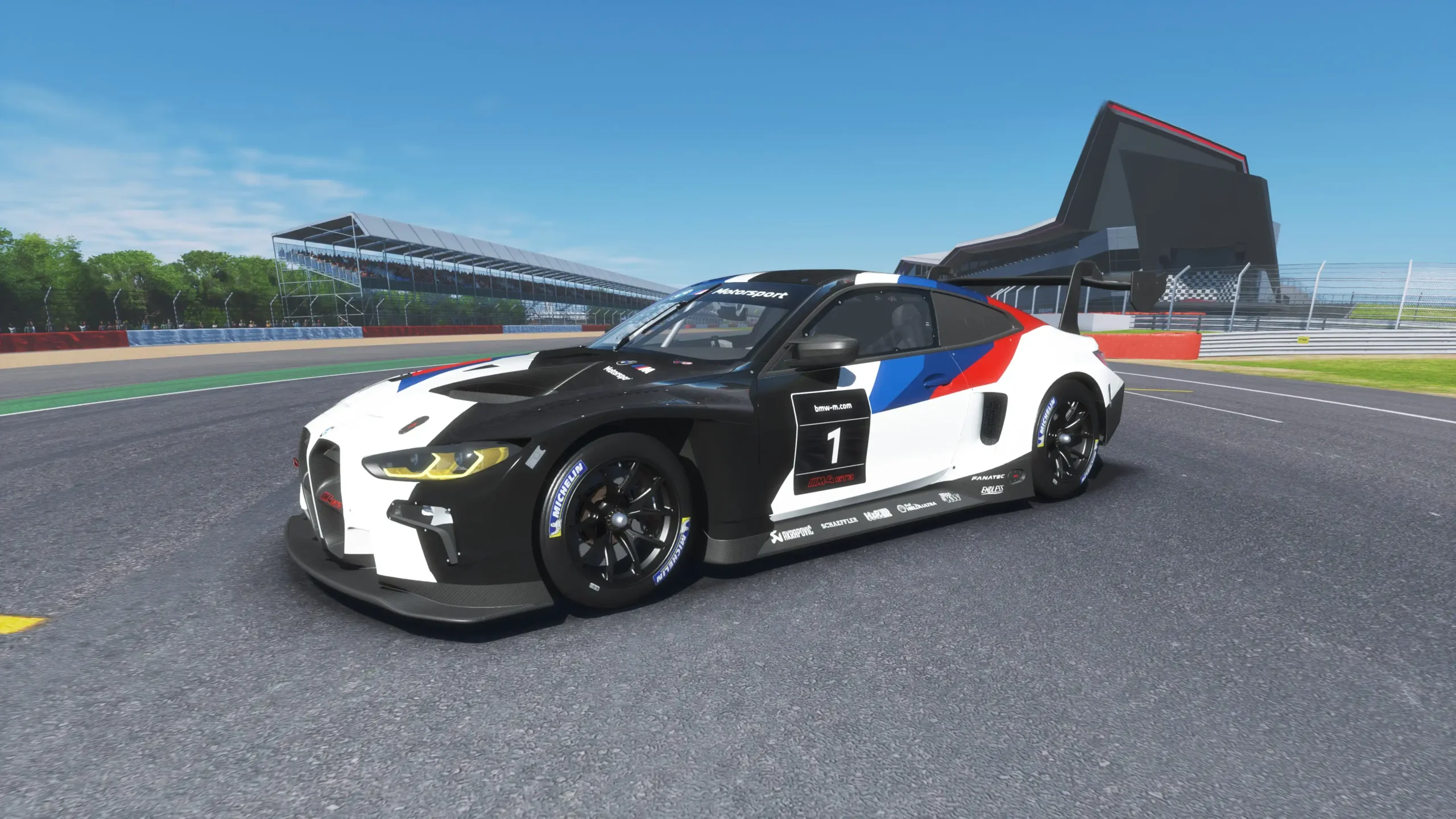 BMW M4 GT3 zooms around a track in an exciting video game at Apex Racing Lab.
