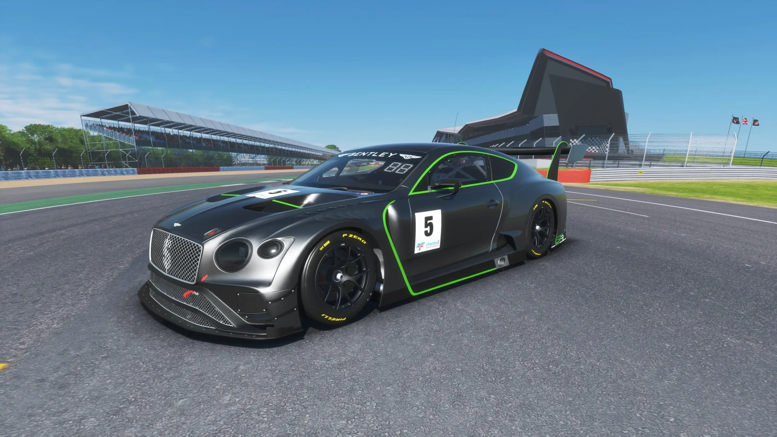 Bentley Continental GT3 racing car speeding on a track in a thrilling video game simulator at Apex Racing Lab.
